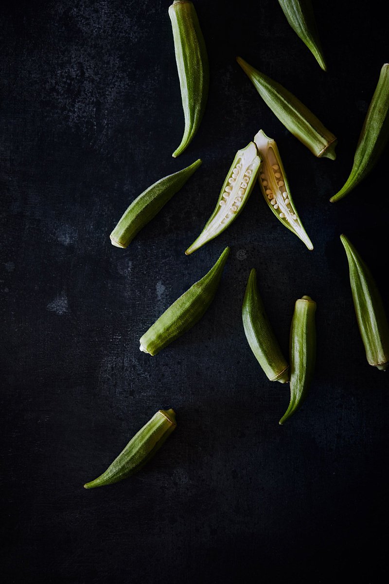Okra pods whole and split to their seeds, RAW by Hannah Caldwell